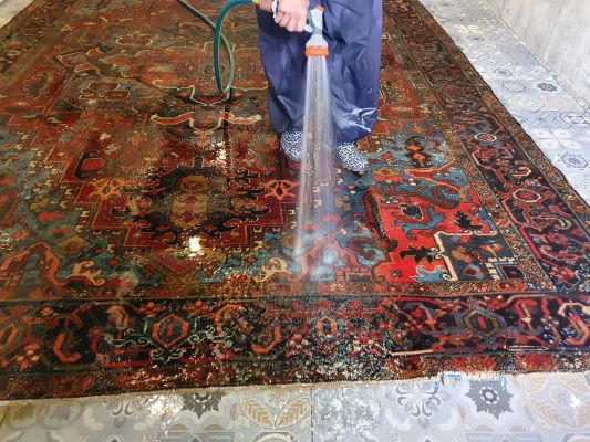 Rinsing a Persian rug